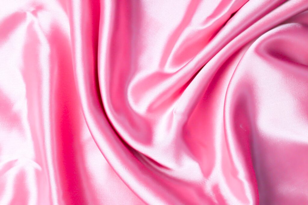 Pink silk fabric for 'Áo Tứ Thân': Lustrous, elegant, and captivating