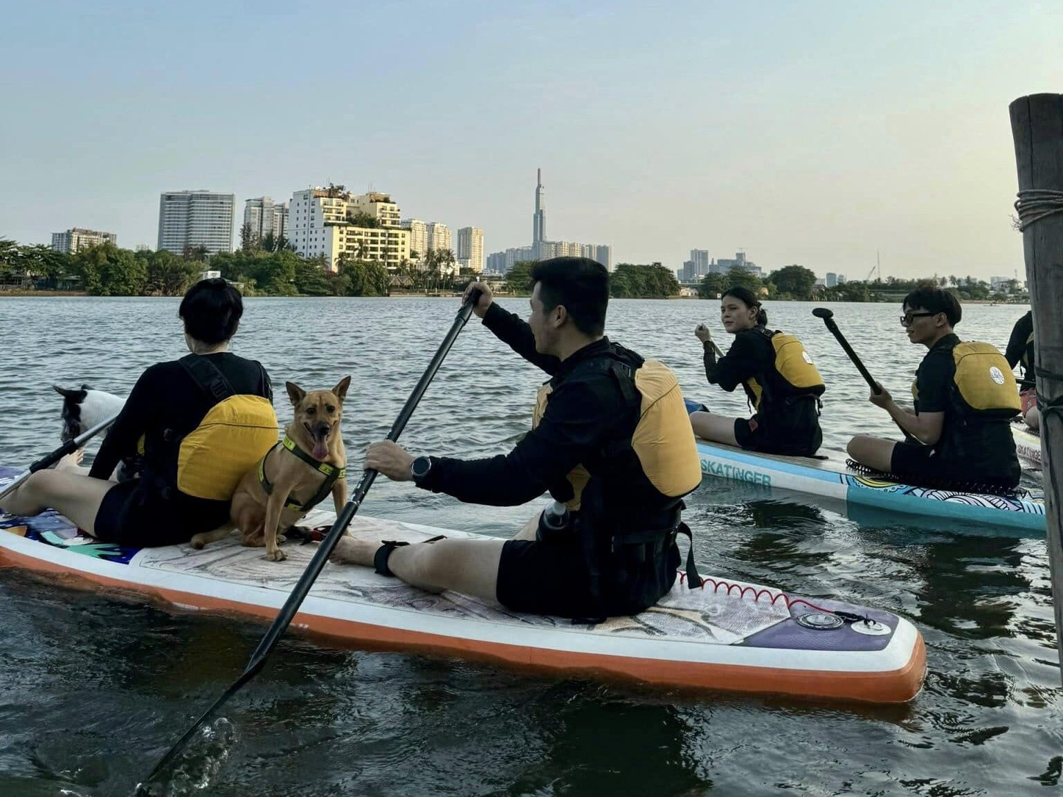 Young people enjoying surfing in Saigon