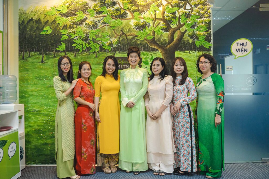 VLS female staff and teachers wearing Áo Dài during the Vietnamese Women’s Day celebration at VLS.