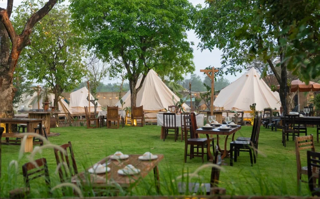 The dining area and tent setup at Savora Farm & Glamping.