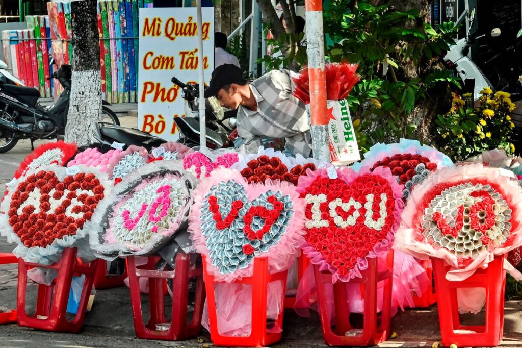 Shopkeepers in Vietnam sell flowers and gifts on Valentine's Day. 
