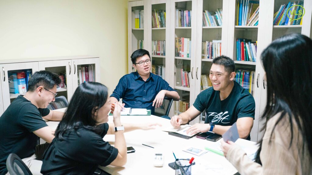 Vietnamese learning students at VLS sharing ideas and stories during class, enhancing both language and cultural understanding.