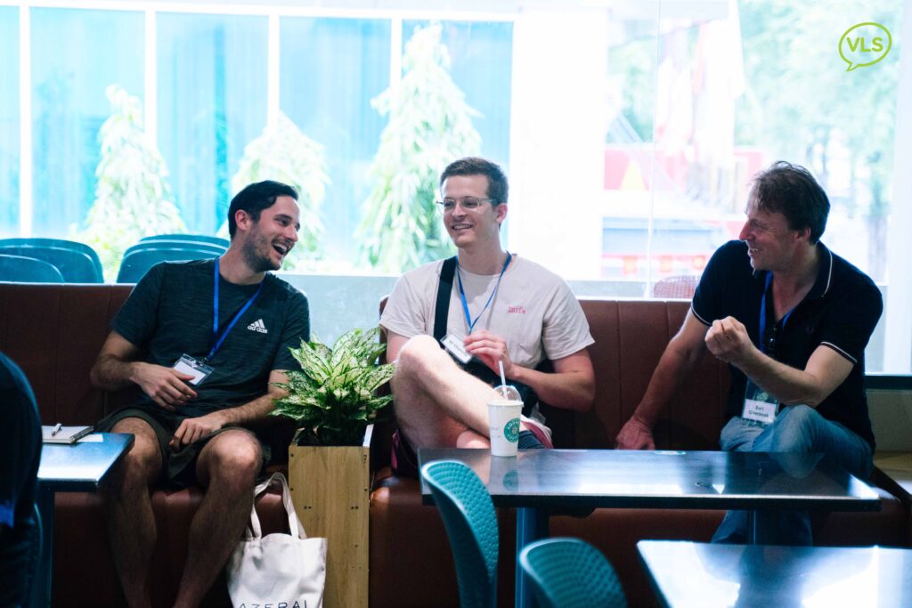 Students engaging in a Vietnamese language class through real-life conversation practice.