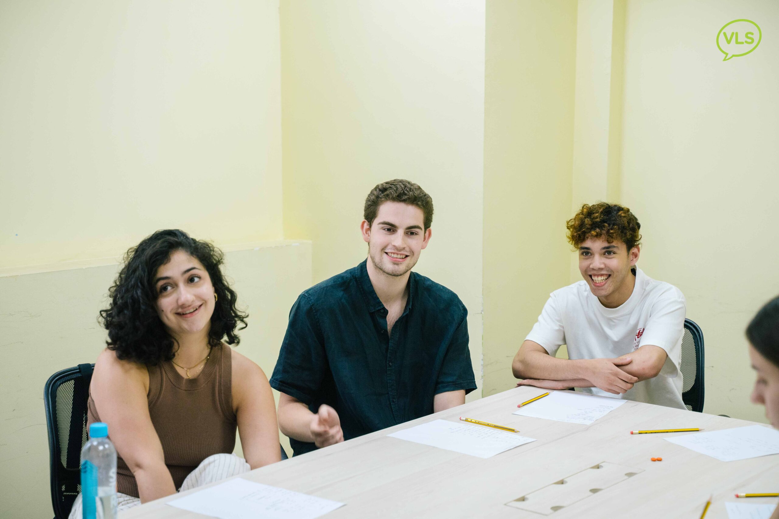 Small group Vietnamese learning session with interactive speaking practice